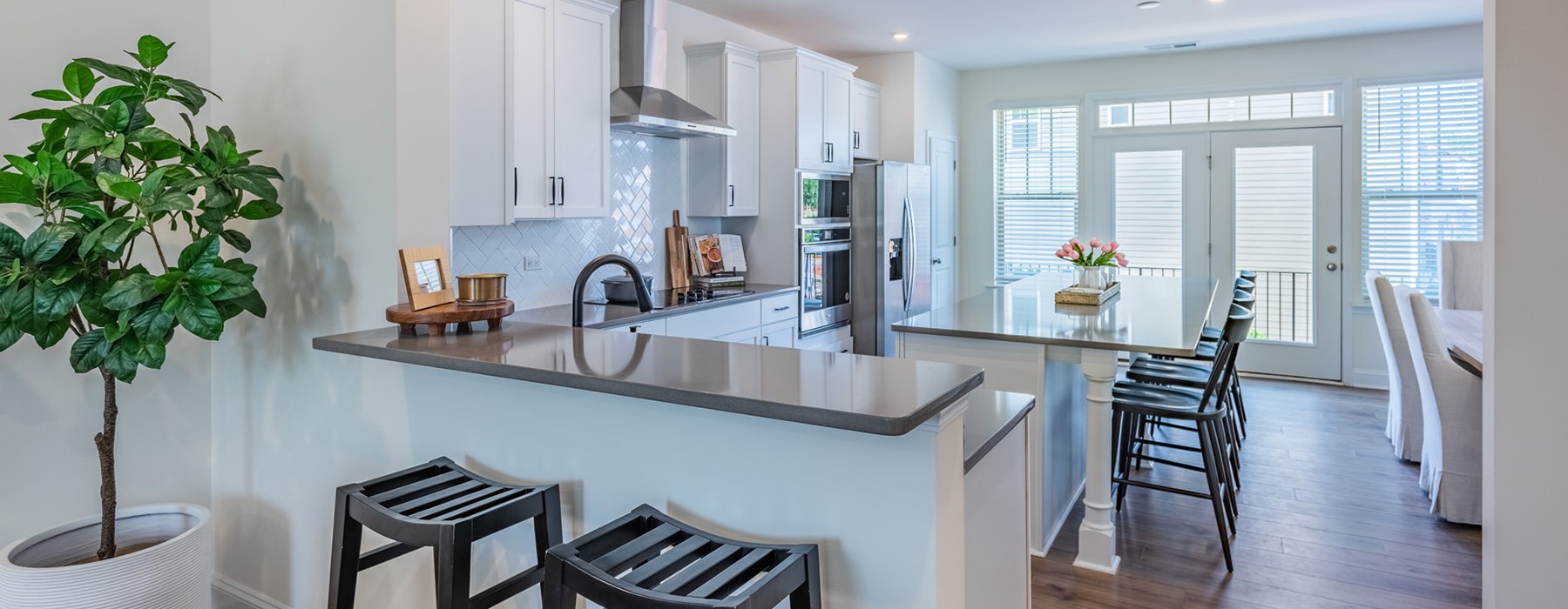 large kitchen with large island and many seats