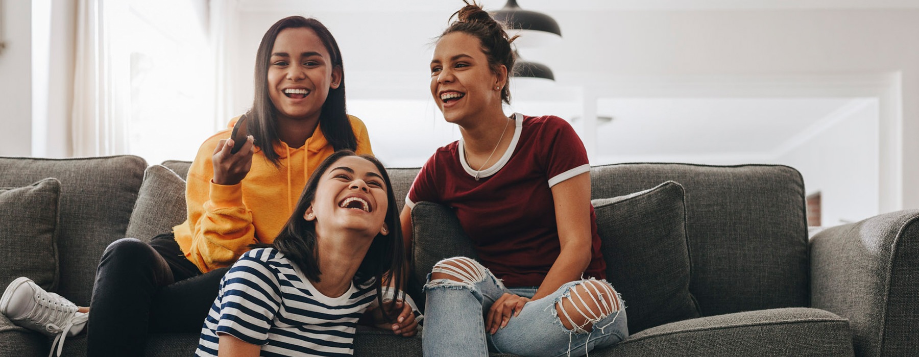 friends having fun on a couch