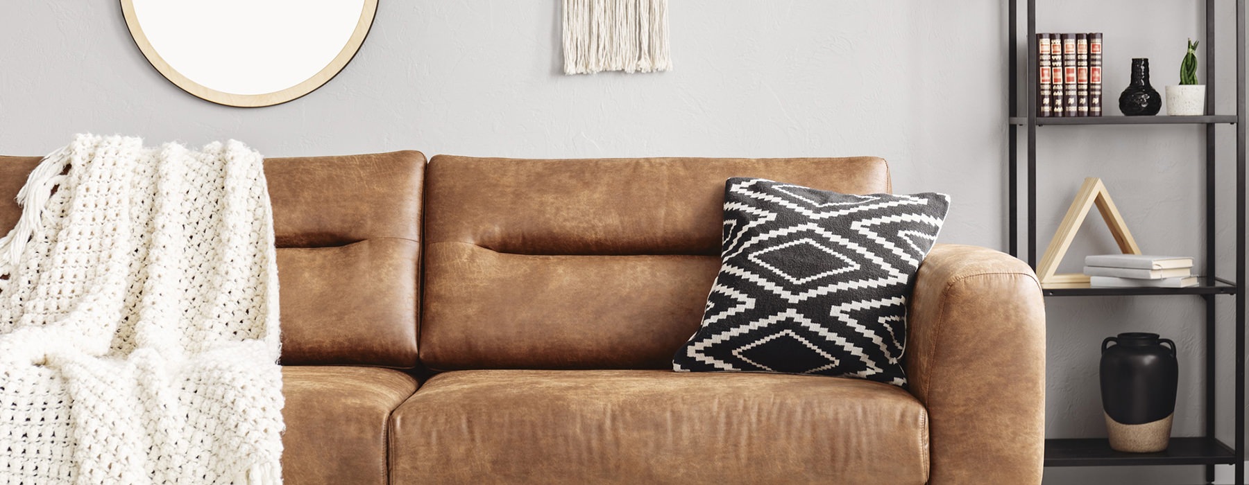 beige couch with white walls